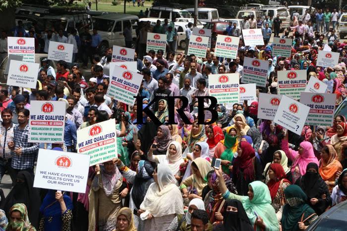 NHM employees protest against Govt